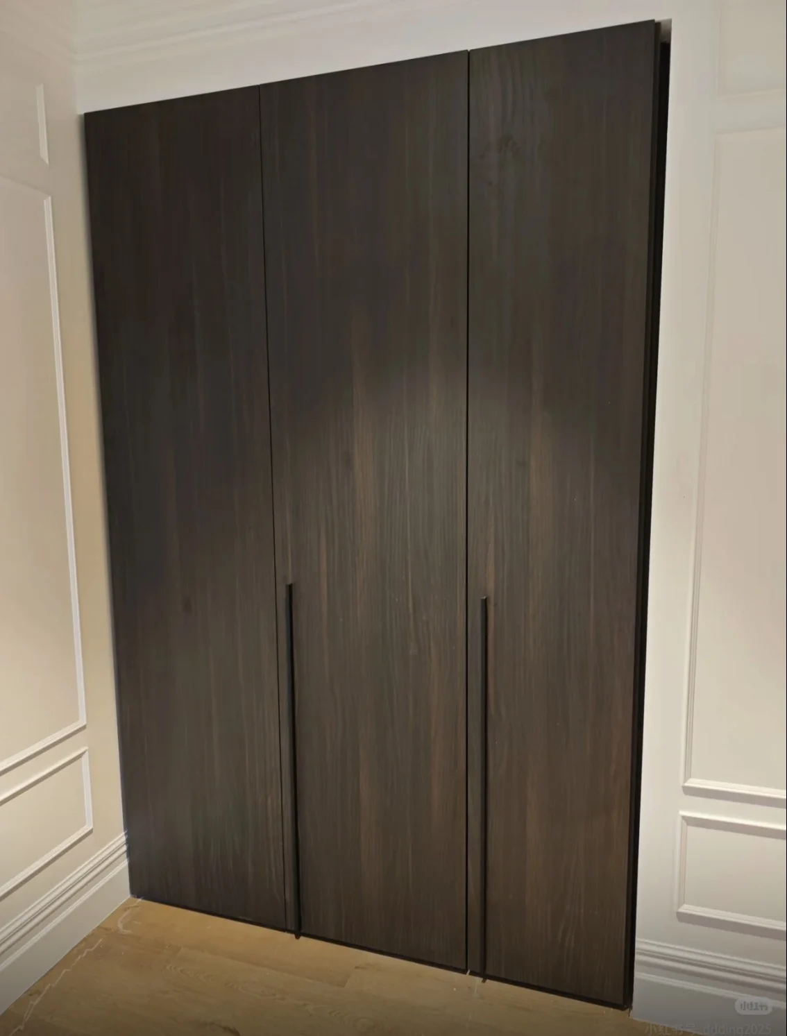 Dark timber wardrobe